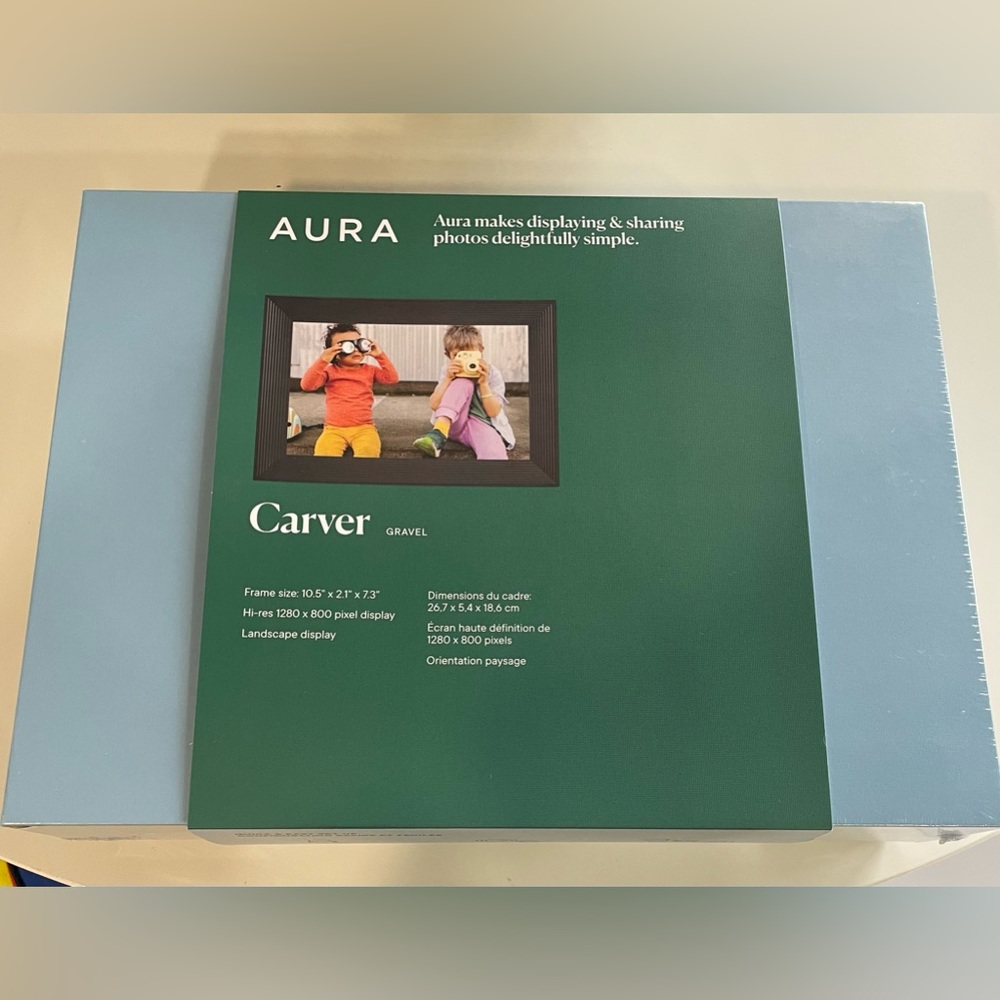 Brand new unopened Aura Carver photo displaying and sharing